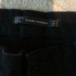 ZARA black jeans with fringe pom poms